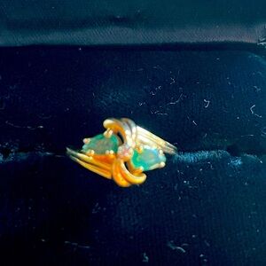 14k gold emerald ring with small diamond